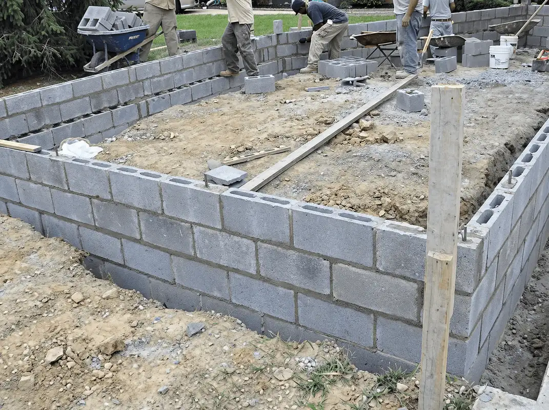 Professionals building a foundation with blocks in Hollywood, FL