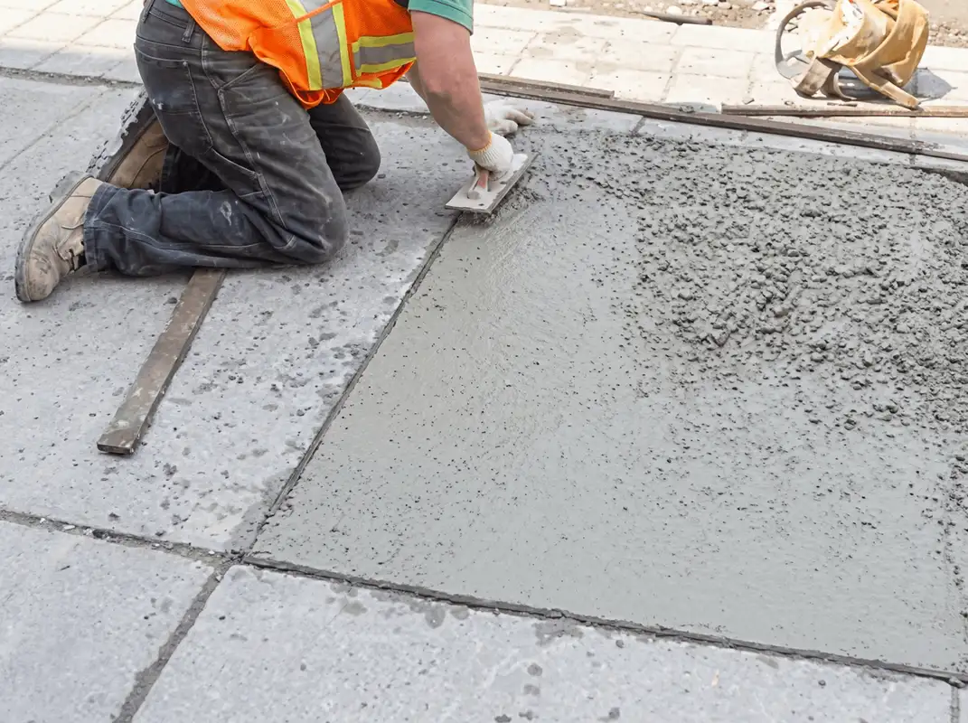 Professional repairing a concrete floor in Hollywood, FL